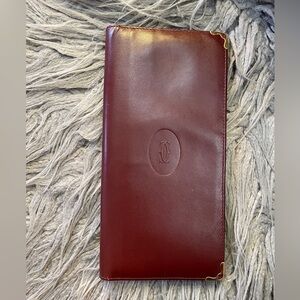 Cartier UNUSED Vintage Bordeaux Leather Wallet with Gold Accents